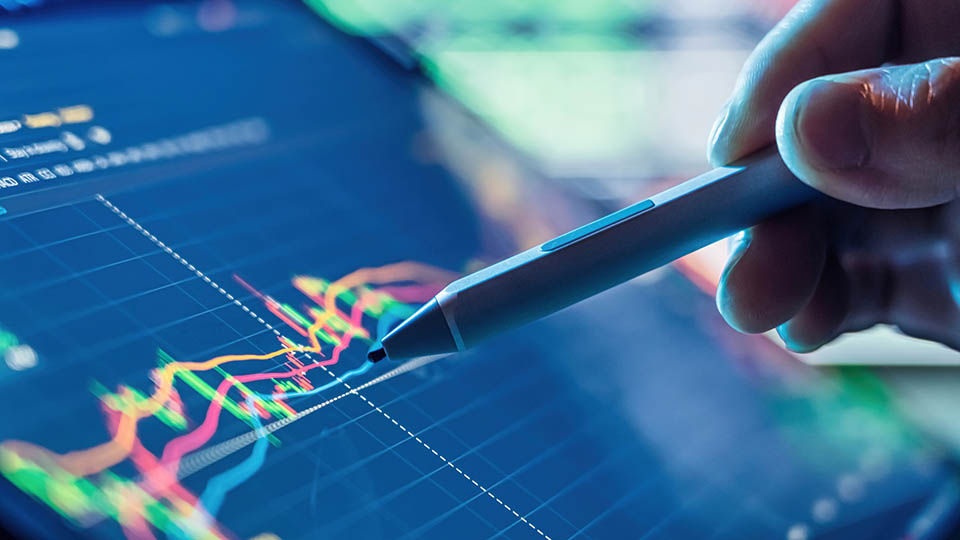 Businessman use tablet and smart phone for Stock Market