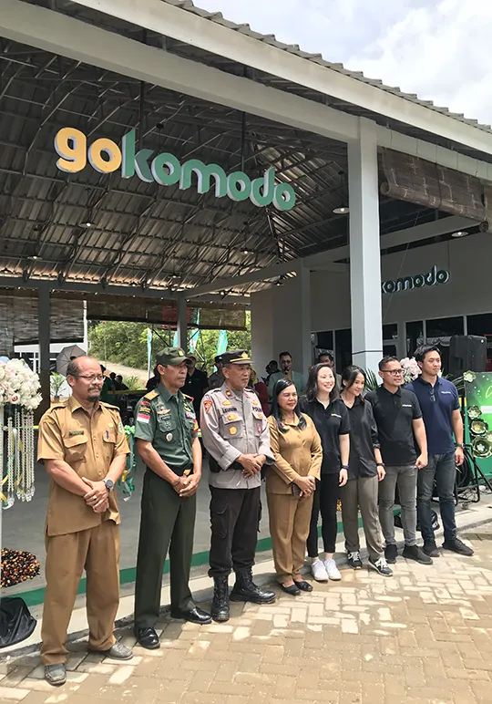 Members of the Gokomodo team with local government authorities at the opening of Gokomart in Bodok, Indonesia.