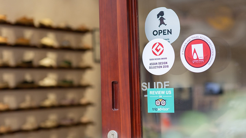 Proof of design awards and the open-to-review logo graciously welcome customers
