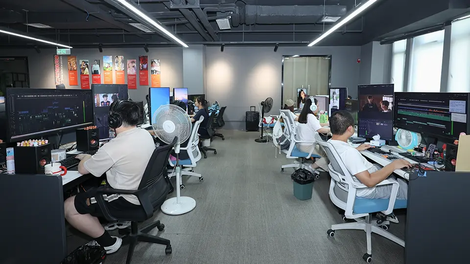 Visualization artists working in the production studio