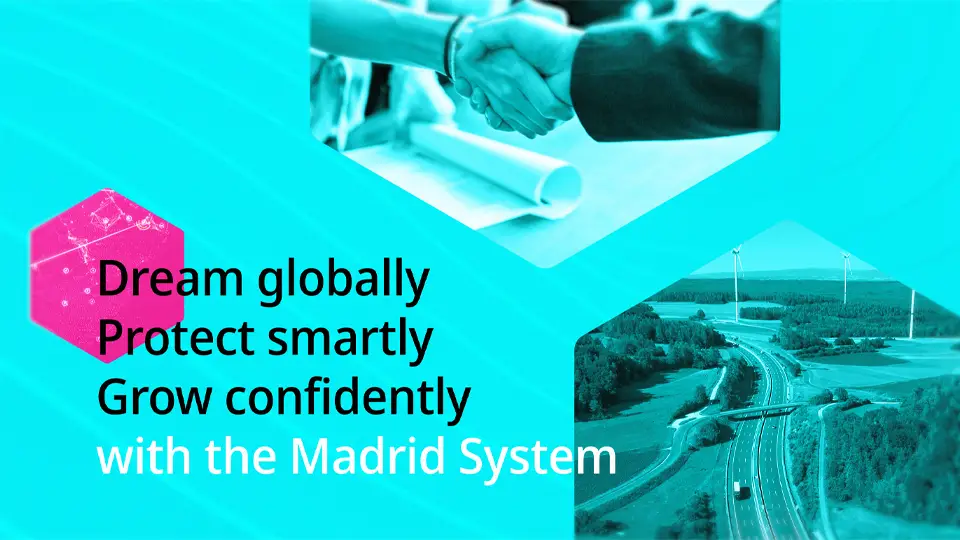Turquoise Madrid System banner shows a business handshake and winding highway beside the message: “Dream globally, protect smartly, grow confidently."
